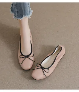 Detailansicht der nuderosa Ballerinas mit schwarzer Schleife und Kieselleder-Struktur