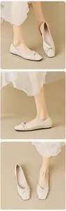 Detail of cream loafers with knot design, square toe and soft leather for women