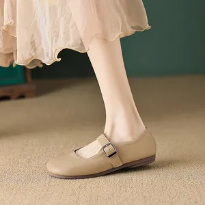French style khaki Mary Jane flats with round toe and adjustable buckle strap