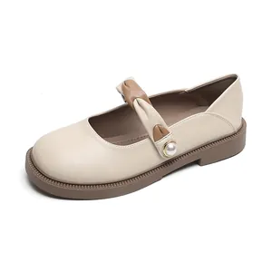 Zapatos Mary Jane beige con plataforma de estilo francés con correas cruzadas y perla