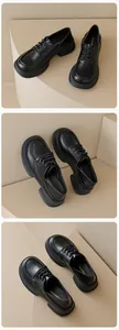 Macro views of black platform derby shoes with lace-up detail and polished finish