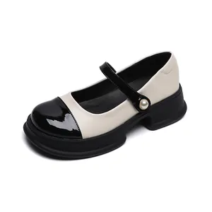 Vintage Mary Jane-schoenen met plateauzool in zwart-wit leer met parelgesp