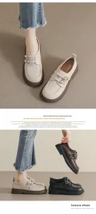 Detailed view of women's platform loafers with double metal buckles and matte leather finish