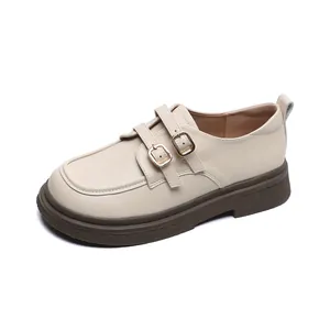 Classic beige platform Mary Jane loafers with double gold buckles and thick rubber soles