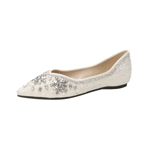 Elegant pointed toe flat shoes with silver sequins and sparkling crystal embellishments