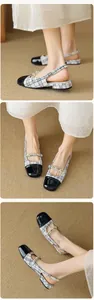 Detailed views of tweed Mary Jane flats with pearl straps and black patent toe cap