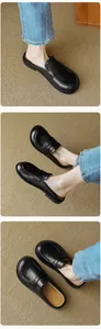Close-up of black leather pointed-toe mules shown from three different angles on a beige rug