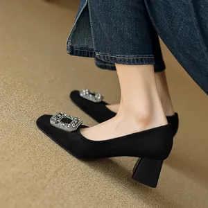 Elegant black suede block heel pumps with sparkling rhinestone buckle on square toe