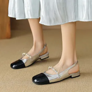 French retro slingback sandals in silver and black patent leather with pearl detailing