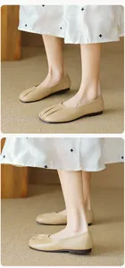 Detailed view of apricot pleated round-toe flat shoes with soft vintage leather texture