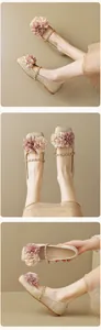 Detail of champagne flat shoe featuring fabric flower decor and chic metal chain strap