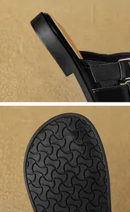 Detail of stable chunky heel and non-slip rubber sole on women's mule sandals