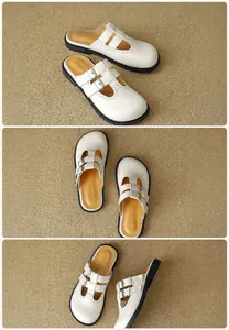 Detailed views of white Mary Jane mules featuring double buckle straps and brogue cut-outs