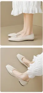 Detail of cream square-toe flat shoes with pleated texture and soft leather finish