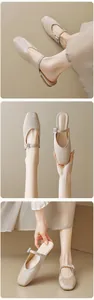 Detail of champagne satin Mary Jane mules featuring crystal buckle and retro square toe