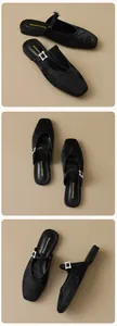 Detail of black velvet Mary Jane mules with rhinestone square buckle and square toe design