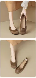 Close-up of brown square-toe ballet flats in matte leather with soft flat soles
