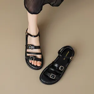 Sandalias de cuero negro estilo francés para mujer con hebillas de oro y costura blanca