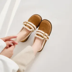 Damen-Birkenstock-Loafer aus braunem Wildleder mit Fellfutter und goldenen Schnallen