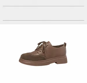 Detail of brown microfiber leather oxford shoes with 4cm block heel and rubber sole