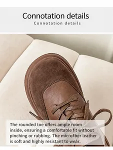 Detail of round toe brown loafers made from premium microfiber leather with woven laces