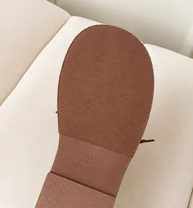 Detail of durable non-slip rubber outsole with flexible texture on vintage Oxford shoes