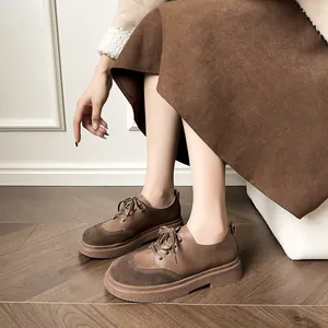 Retro dark brown platform loafers for women with a vintage British style and round toe