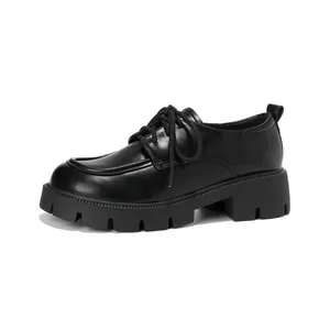 Classic black platform loafers with round toe and lace-up design on white background