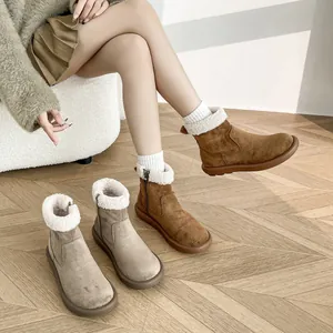 Women's platform snow boots with fleece lining and side zipper in caramel and grey