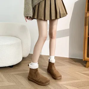 Brown platform snow boots with warm faux fur lining and side zipper for winter