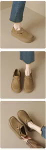 Three-angle views of brown suede platform Birkenstock mules with metal buckle and thick sole
