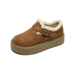 Women's warm brown suede platform loafers with faux fur lining and buckle detail