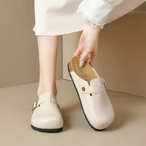 Chic cream platform mule clogs in Birkenstock style with adjustable buckle and cork sole