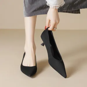 Elegant black pointed-toe kitten heel pumps for professional women with matte finish