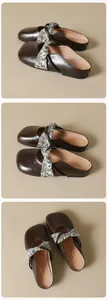 Detailed view of women's brown leather mule with floral strap and gold logo inner sole