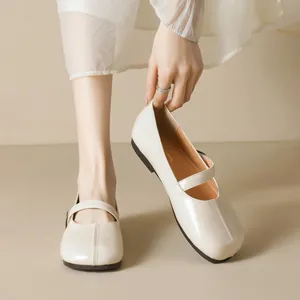 Chic cream round toe Mary Jane flats with delicate strap and elegant leather finish