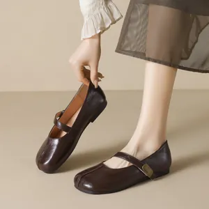 Classic dark brown leather Mary Jane flats with round toe and vintage buckle strap
