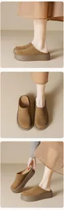 Close-up of brown suede platform mule slippers with textured matte finish and thick soles
