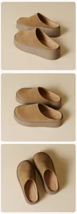 Three-way view of platform brown suede clogs with thick soles and fine stitching
