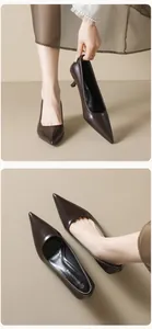 Detailed view of the dark brown pointed toe stiletto with brand and size stamp