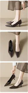 Close-up of elegant pointed-toe kitten heel pumps in dark brown leather finish