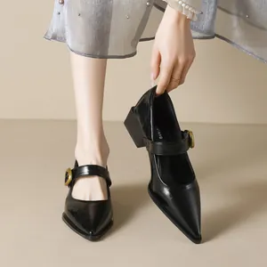 Classic black pointed-toe Mary Jane shoes with patent leather and stylish chunky heels