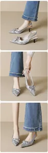 Detail of silver pointed-toe slingback kitten heels with satin bow and delicate finish