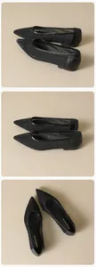 Makro-Detail der schwarzen spitzen Mesh-Ballerinas mit funkelnden Strasssteinen und weicher Sohle