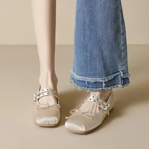 Elegant champagne satin ballet flats with square toe and double eyelet straps