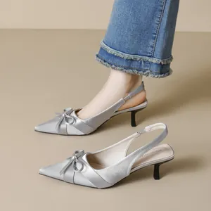Silver satin pointed toe kitten heel slingback shoes with elegant bow detail
