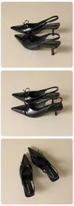 Vista dettagliata di slingback nere a punta con fiocco raffinato e finitura lucida