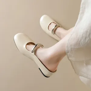 Elegant cream round toe Mary Jane flats with silver metal strap detail for women