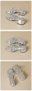 Detail shot of silver metallic square-toe sandal with rhinestone bow and block heel