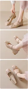 Detailed views of apricot square toe Mary Jane flats with bow and patent finish